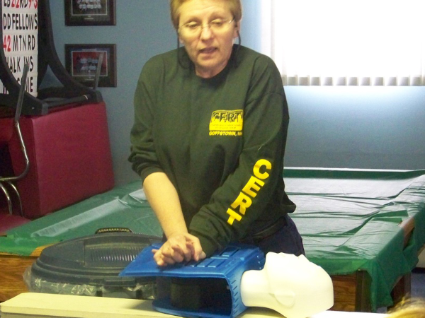CERT member displaying CPR