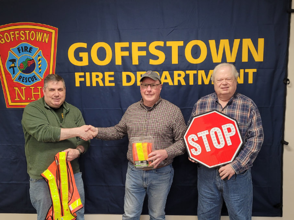 CERT members in front of Fire Department banner